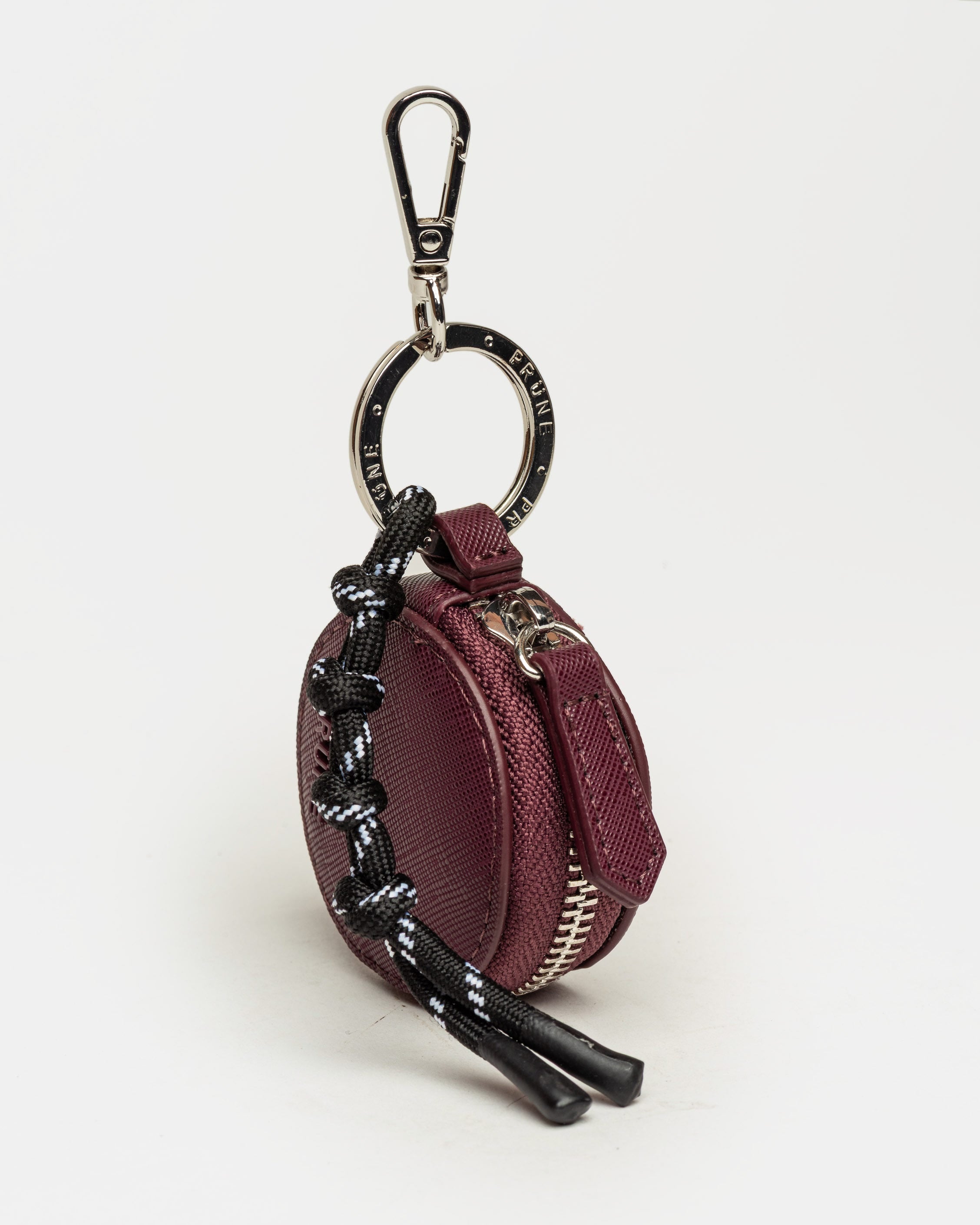 Llavero Charm Round en efecto cuero